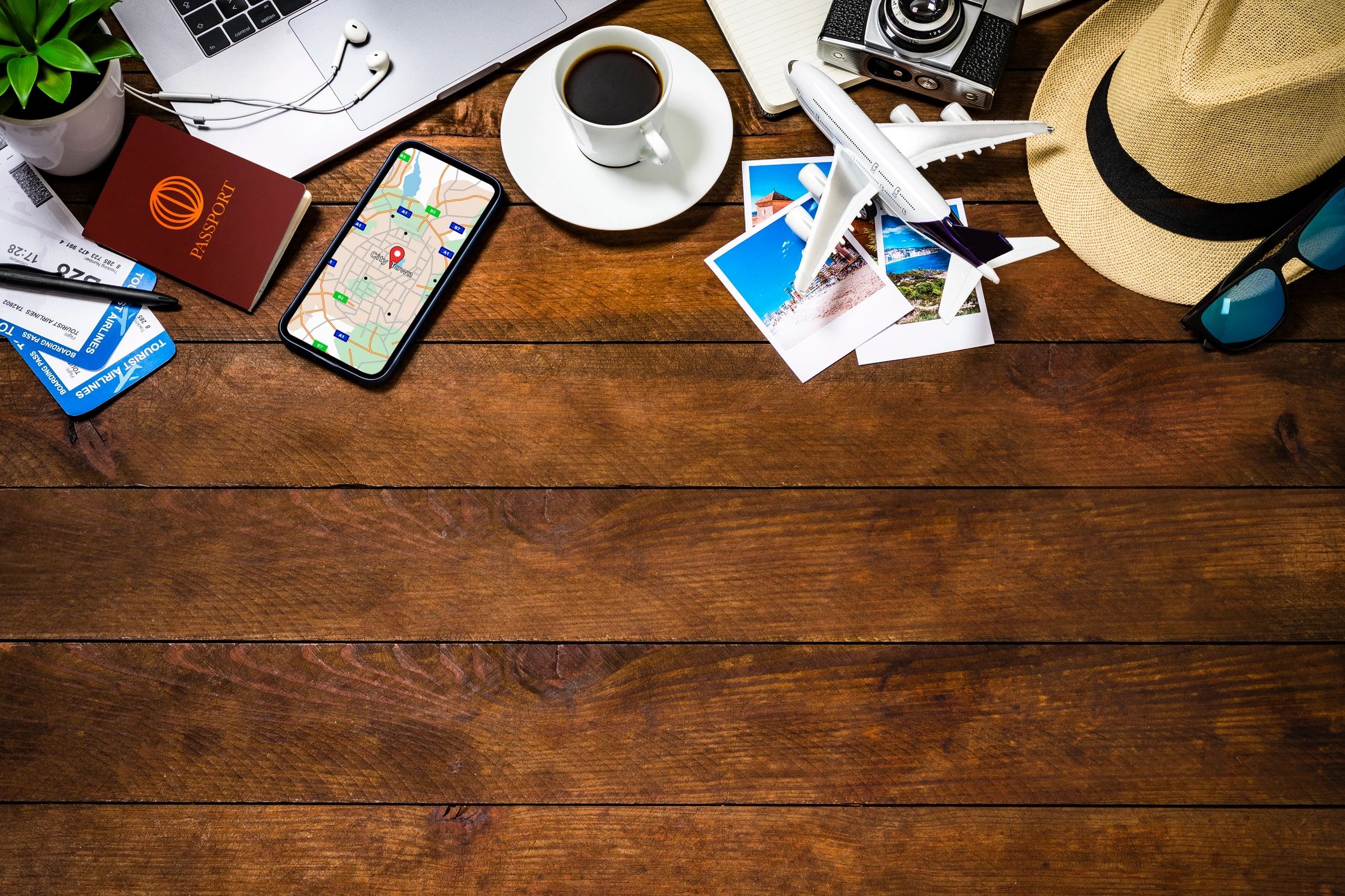 Travel planning desk with passport and documents