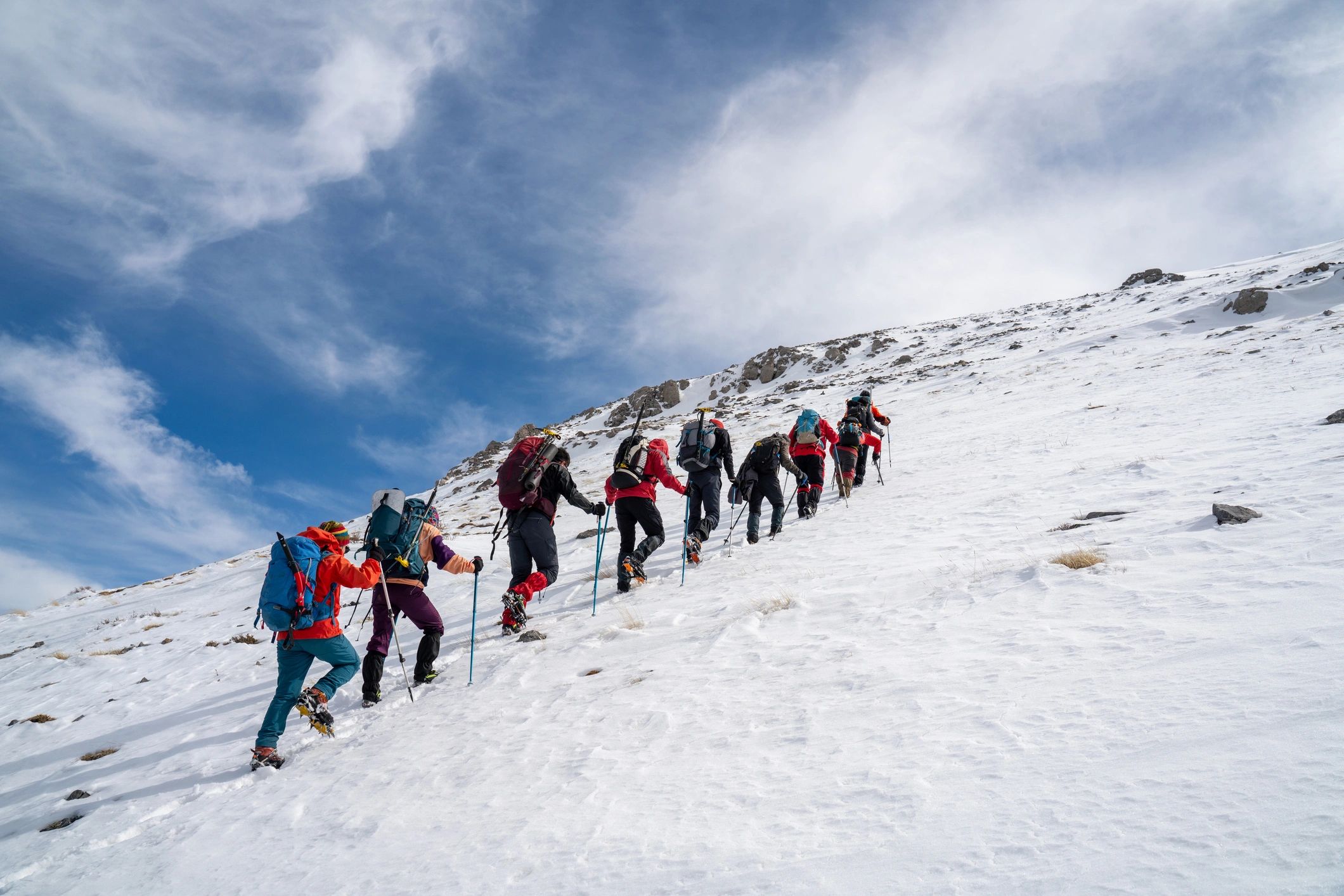 Adventure travelers hiking in the mountains