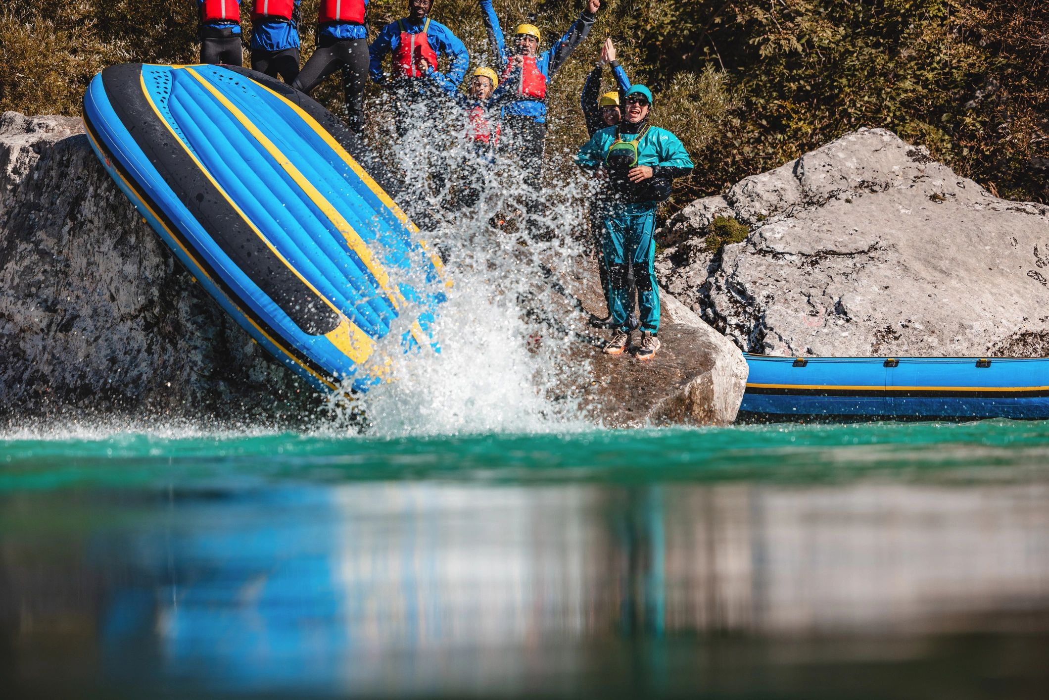 Group enjoying a rafting adventure on river rapids