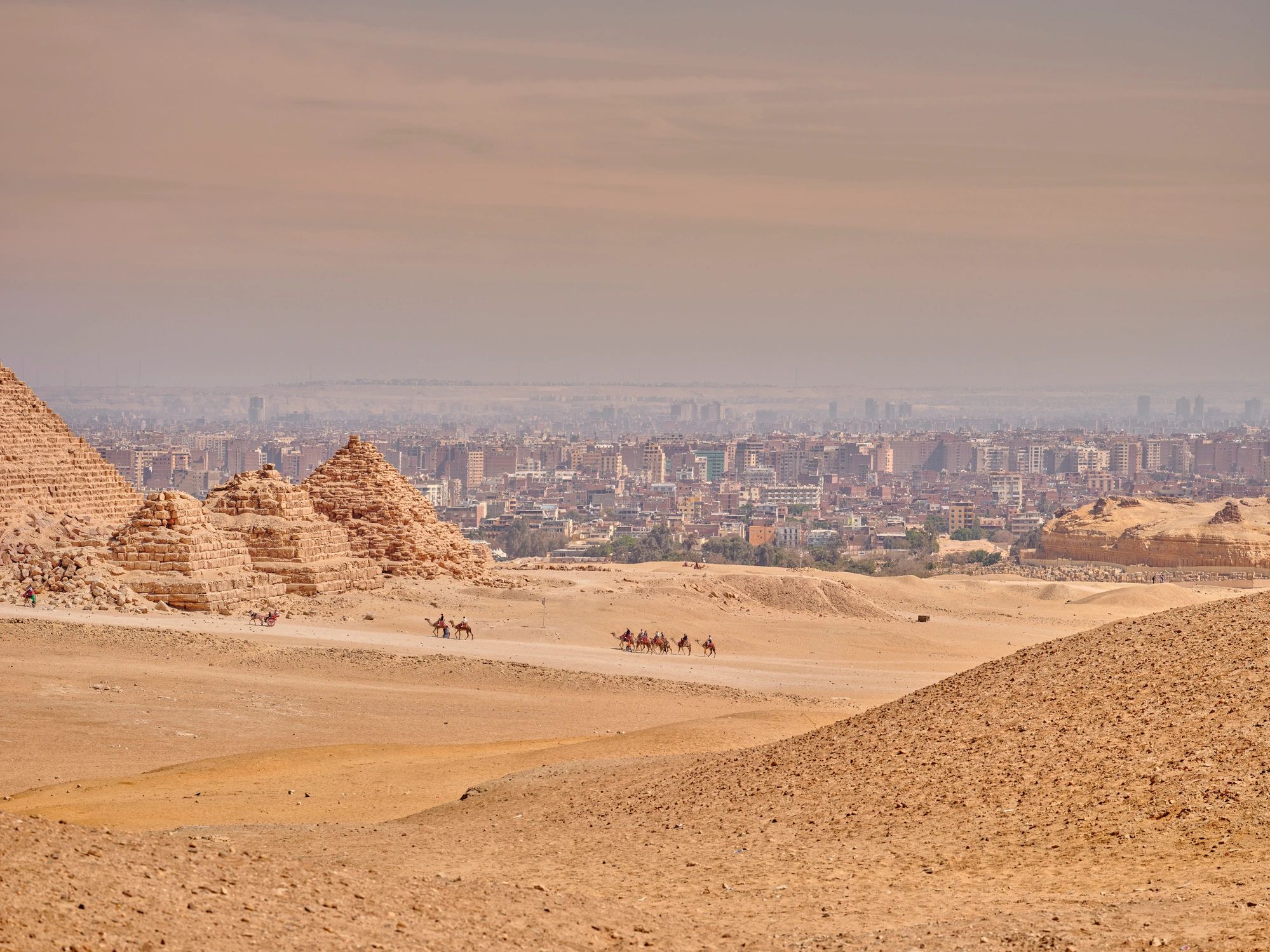 Pyramids of Giza desert view at dusk